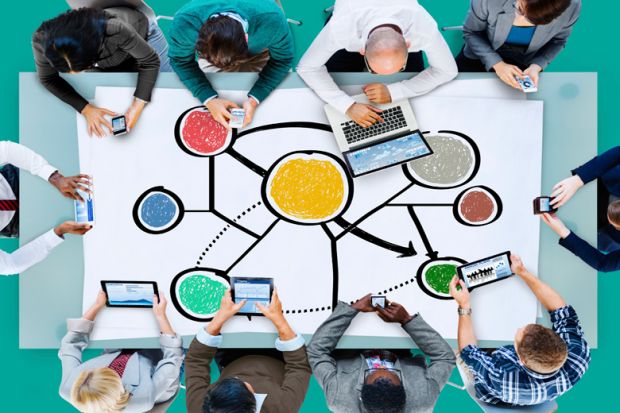 Students sharing data using mobile devices Students sharing data using mobile devices
