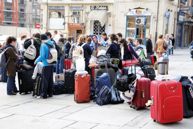 Students waiting for bus, Plaza del Poeta Iglesias, Salamanca, Spain