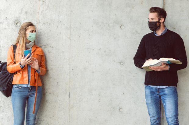 Students social distancing illustrating return-to-campus and government support needs