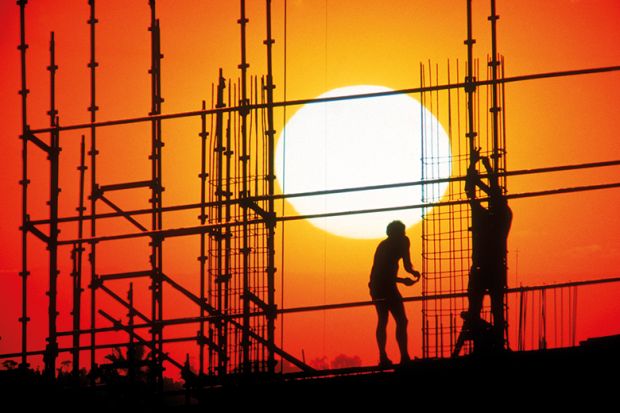 Workers and sunset