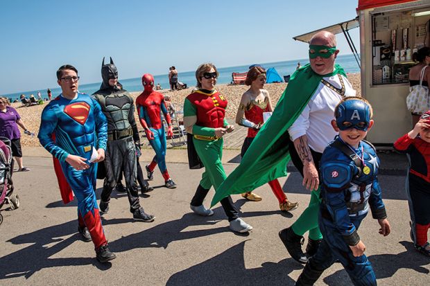 A group dressed as superheroes walk down a promenade during the warm weather on Bank Holiday Monday in Bognor Regis, United Kingdom. To illustrate that under-pressure humanities departments can often have the most impact. A group dressed as superheroes walk down a promenade during the warm weather on Bank Holiday Monday in Bognor Regis, United Kingdom. To illustrate that under-pressure humanities departments can often have the most impact.