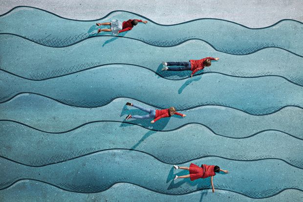 Group of children photographed from above on various painted tarmac surface at sunset Group of children photographed from above on various painted tarmac surface at sunset