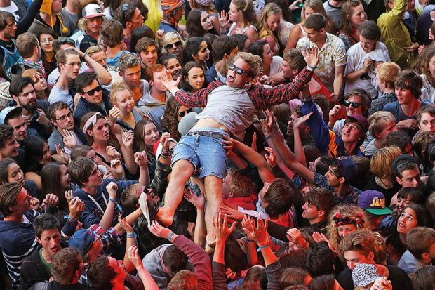 fans crowd surf