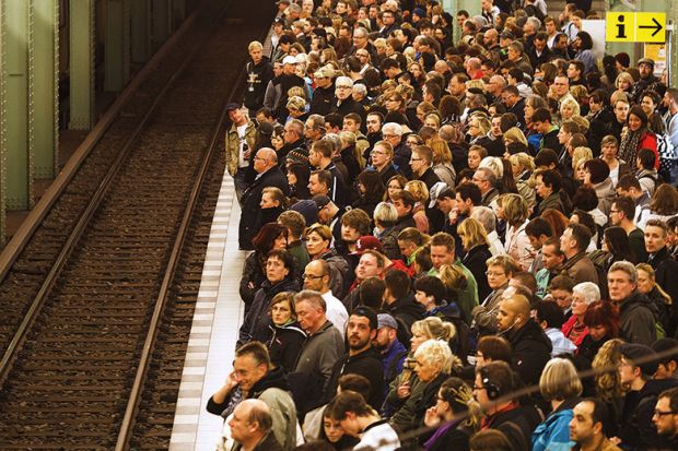 crowd on train platform