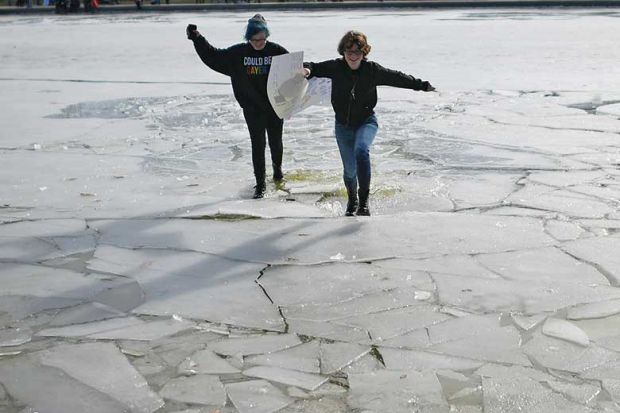 Protestors run over breaking ice