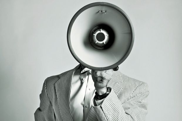 Person holding megaphone