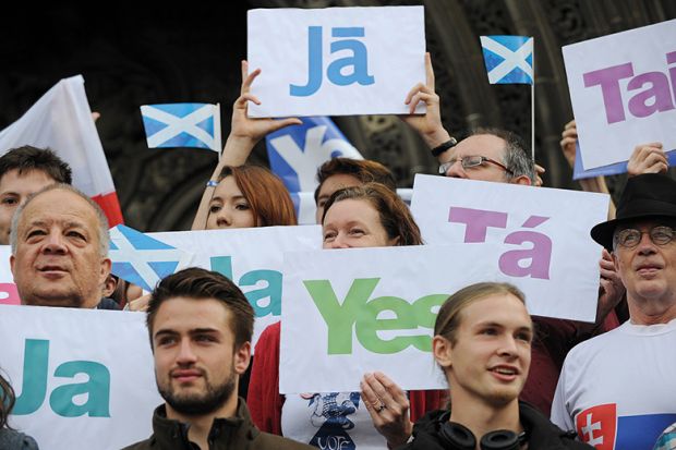 Leaflets with the word 'Yes' written in different languages are displayed. Scottish referendum, 2014. Leaflets with the word 'Yes' written in different languages are displayed. Scottish referendum, 2014.