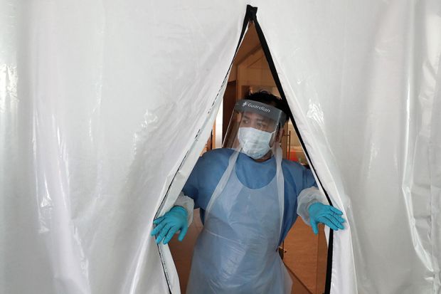 A laboratory technician wearing full PPE (personal protective equipment) works at a new Lighthouse Lab facility dedicated to testing for the novel coronavirus COVID-19, at Queen Elizabeth University Hospital in Glasgow on April 22, 2020. A laboratory technician wearing full PPE (personal protective equipment) works at a new Lighthouse Lab facility dedicated to testing for the novel coronavirus COVID-19, at Queen Elizabeth University Hospital in Glasgow on April 22, 2020.