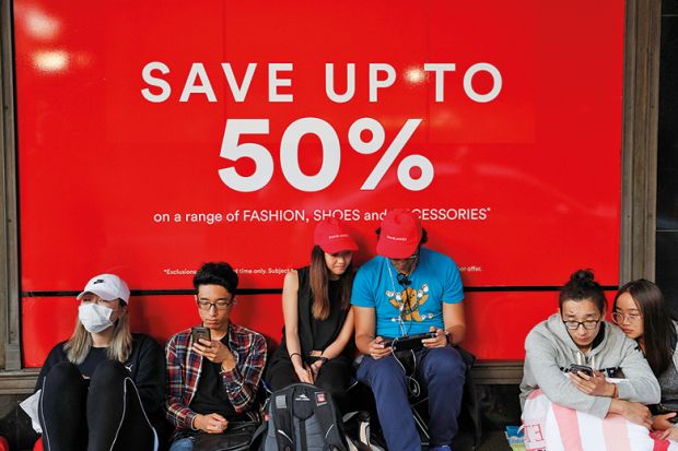 Crowds of people rush into the David Jones Elizabeth St store during the Boxing Day sales on December 26, 2018 in Sydney, Australia
