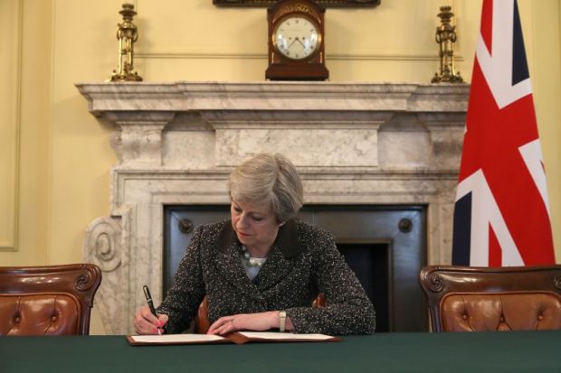 Theresa May signing Article 50 letter