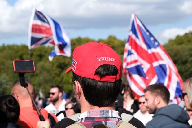 People attend a Charlie Kirk memorial rally by Turning Point UK in Hyde Park, London, 21 September 2025