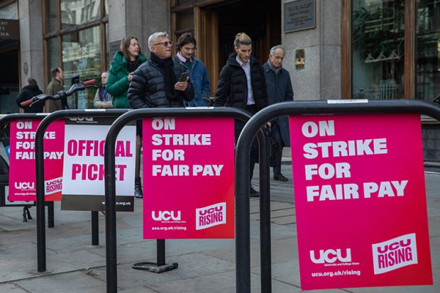 University and College Union (UCU) posters demanding fair pay are pictured at an official picket University and College Union (UCU) posters demanding fair pay are pictured at an official picket