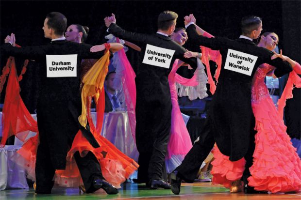 University-branded ballroom dancers dancing