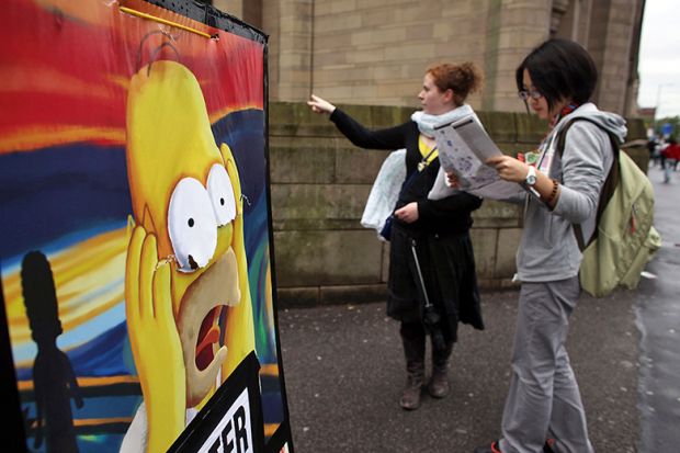 Students arriving for freshers week at the University of Manchester consult their campus map, with a picture of Homer Simpson in despair. To illustrate the shock that certain universities such as Manchester have missed out from the Global Talent Fund. Students arriving for freshers week at the University of Manchester consult their campus map, with a picture of Homer Simpson in despair. To illustrate the shock that certain universities such as Manchester have missed out from the Global Talent Fund.