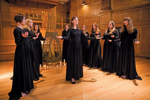 University of Saint Andrews students performing on stage University of Saint Andrews students performing on stage