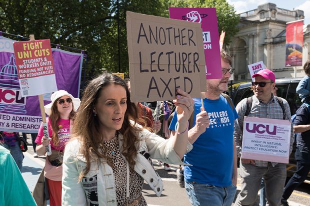 Members of the UCU from the higher education sector march to demand fair pay, secure jobs and real investment in higher education system amid funding cuts, staff redundancies and plummeting international enrolments in London, 10 May 2025.