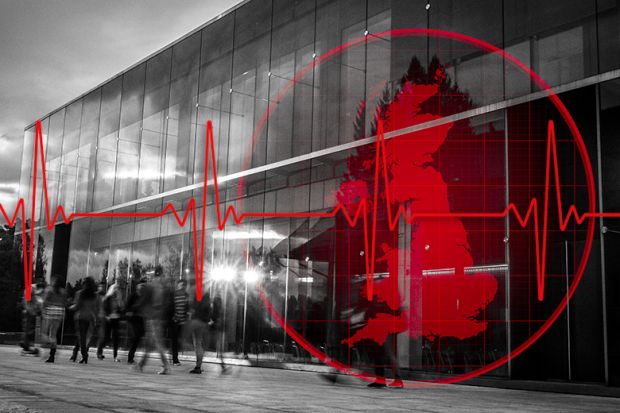 People walking past university building with radar of the UK and heartbeat monitor. To illustrate tracking the latest redundancies in the UK higher education sector. People walking past university building with radar of the UK and heartbeat monitor. To illustrate tracking the latest redundancies in the UK higher education sector.