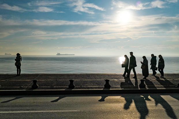 people walking on beach people walking on beach
