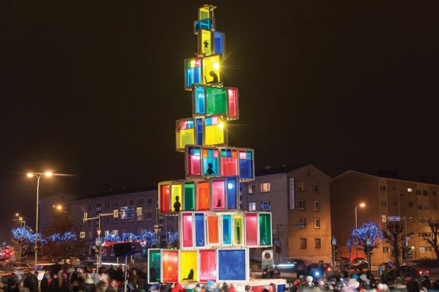 Christmas tree constructed of 121 old windows that come from local old houses is illuminated in Rakvere, Eastern Estonia Christmas tree constructed of 121 old windows that come from local old houses is illuminated in Rakvere, Eastern Estonia to illustrate Is the university really a community?