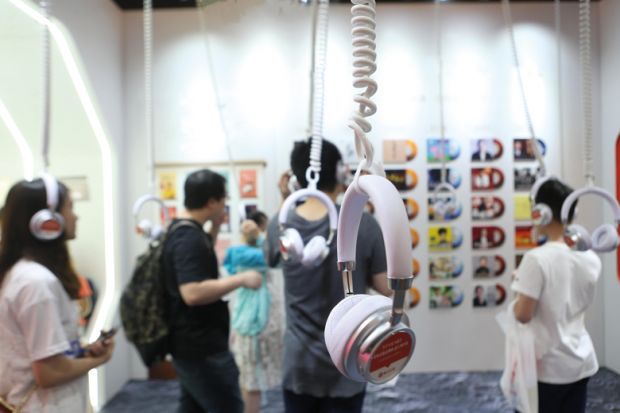 Visitors read audio books Visitors read audio books to illustrate Ear candy