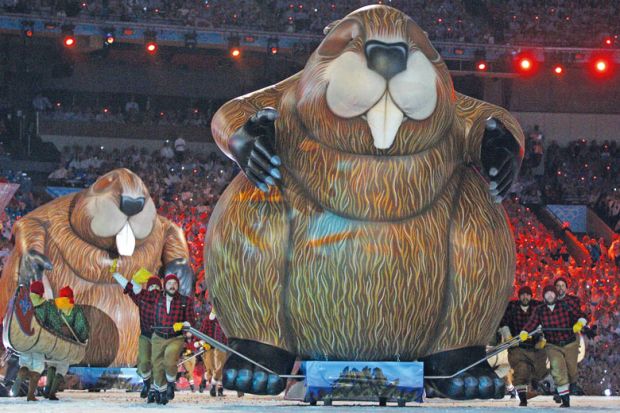 Entertainers dressed as lumberjacks in Vancouver, Canada to illustrate Entertainers dressed as lumberjacks in Vancouver, Canada Canadian universities reel from international student visa cut