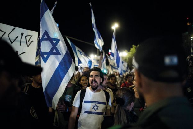 Protesters and Israeli police officers clash during a demonstration near the Israeli Knesset on July 24, 2023 in Jerusalem, Israel. as described in the article