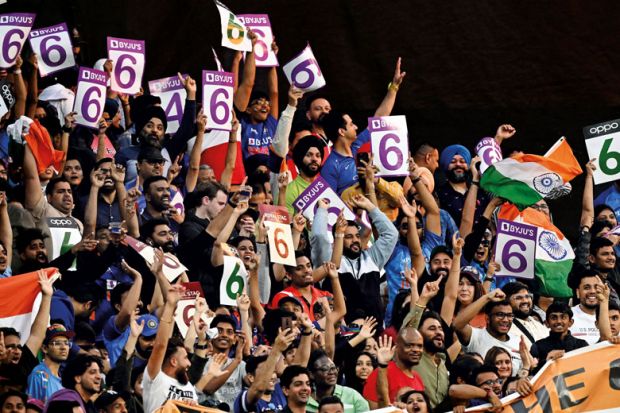 India fans cheer during the men's World Cup India fans cheer during the men's World Cup to illustrate IITs: Can the Indian premier league thrive on the international stage?
