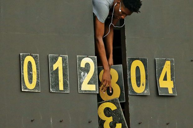 Scoreboard operator dropping numbers Scoreboard operator dropping numbers as a metaphor for University ‘fudging figures’ on sociology cuts