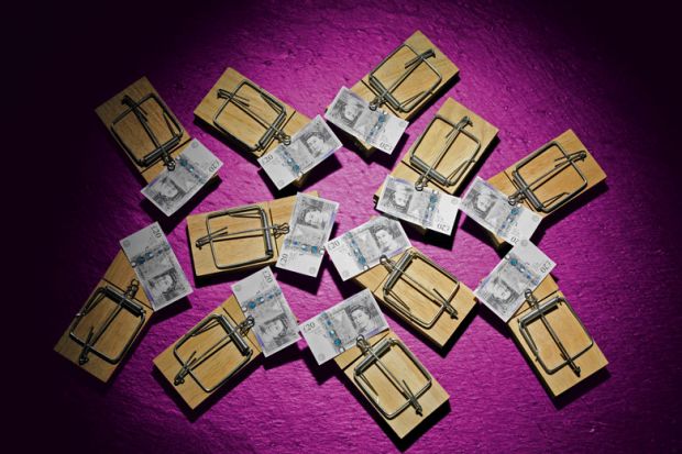  British pounds notes in mousetraps to illustrate For university leaders, a little economics can be a dangerous thing