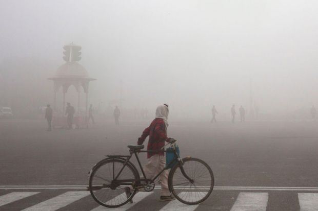 A cyclist amidst morning smog in New Delhi A cyclist amidst morning smog in New Delhi to illustrate ‘Deeper malaise’ threatens future of pan-Asian university