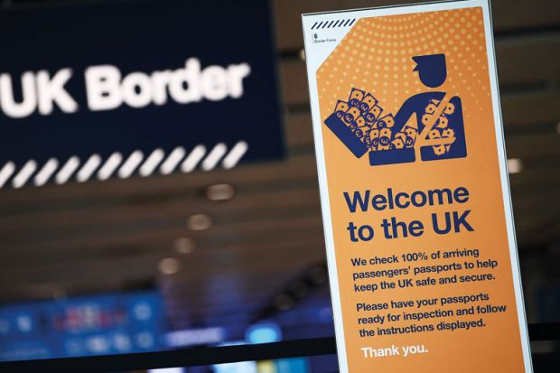 UK border signage is pictured at the passport control in Arrivals to illustrate Can the UK be a science superpower with super-high immigration fees?