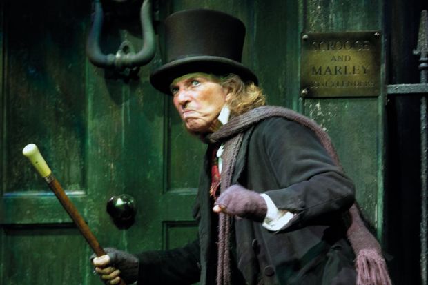 Tommy Steele (as Scrooge) in the production Scrooge Tommy Steele (as Scrooge) in the production Scrooge to illustrate Most universities in marking boycott threaten to dock full pay