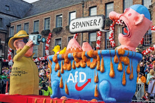 Carnival float depicting the secret service spying on right-wing party AfD in Dusseldorf. Carnival float depicting the secret service spying on right-wing party AfD in Dusseldorf. to illustrate German universities could be ‘less attractive’ as far right rises