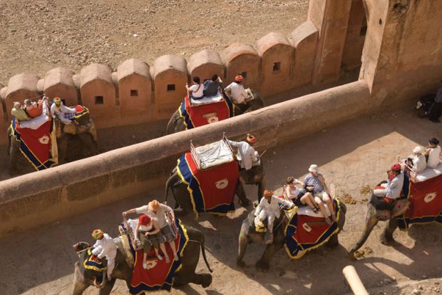 Tourists ride on elephants up to the Amber Fort, Jaipur, India. Tourists ride on elephants up to the Amber Fort, Jaipur, India.