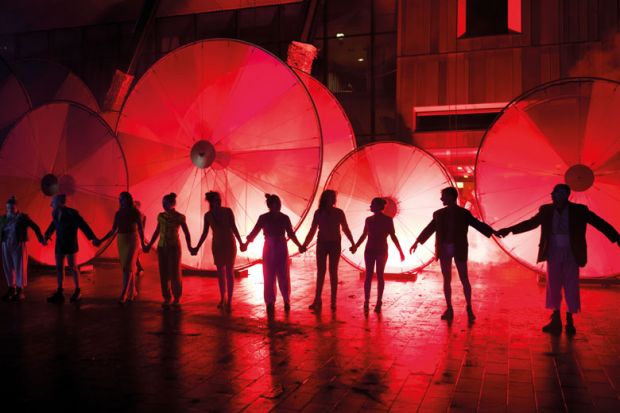 Performers holding hands ready for the final bow Performers holding hands ready for final bow to illustrate Drama college closure spotlights struggle for acting courses