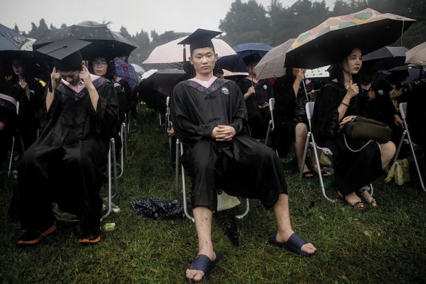 Ten thousand graduates during their ceremony of Wuhan University Ten thousand graduates during their ceremony of Wuhan University to illustrate Chinese v-cs told to visit companies to boost graduate employment
