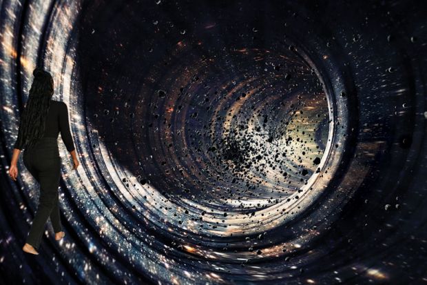 Composite image lady walking into the Black hole concept with deep universe galaxy, planets, stars.as a metaphor for Making the ‘disordered cosmos’ add up.