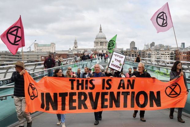 Climate activists from the Extinction Rebellion group cross the Millennium bridge in central London Climate activists from the Extinction Rebellion group cross the Millennium bridge as a metaphor for How I became a climate activist