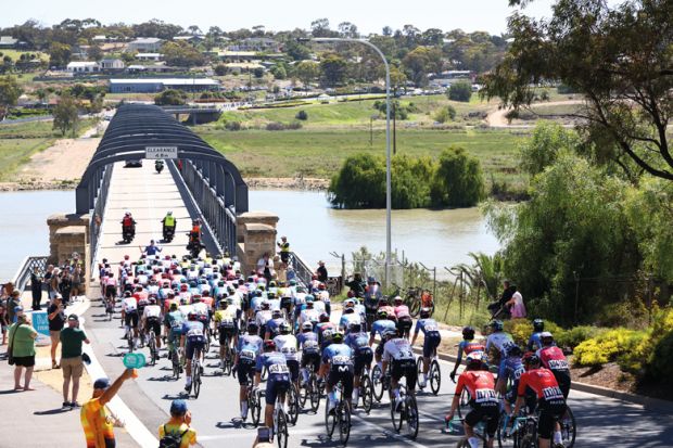 Cyclists in the Santos Tour Down Under crossing Murray Bridge, Australia