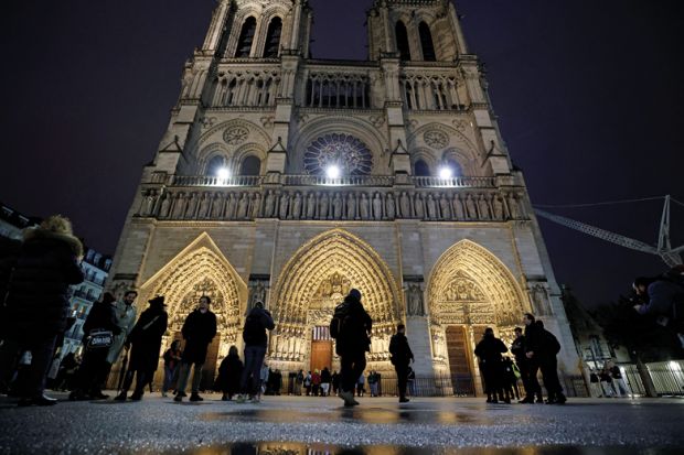 People arrive to attend a second mass, open to the public, at the Notre-Dame de Paris cathedral to illustrate The experts who brought Notre-Dame back to life