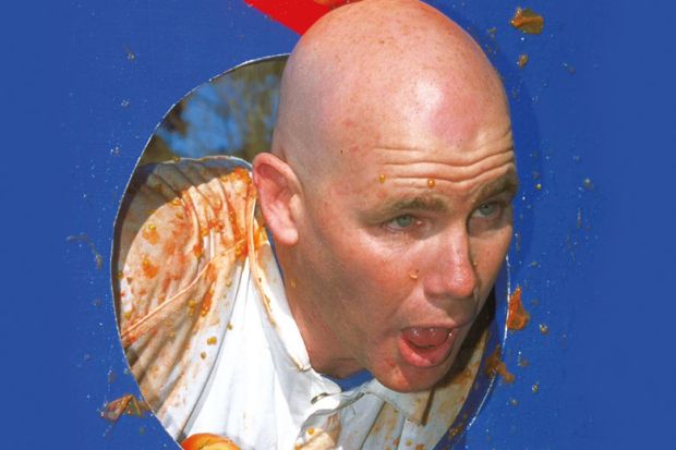  Former AFL footballer Andrew Jarman is pelted with tomatoes by Carlton Football club supporters after losing a bet he had made in the pre season to illustrate ‘Too ugly to teach’: universities ‘must end’ anonymous evaluation