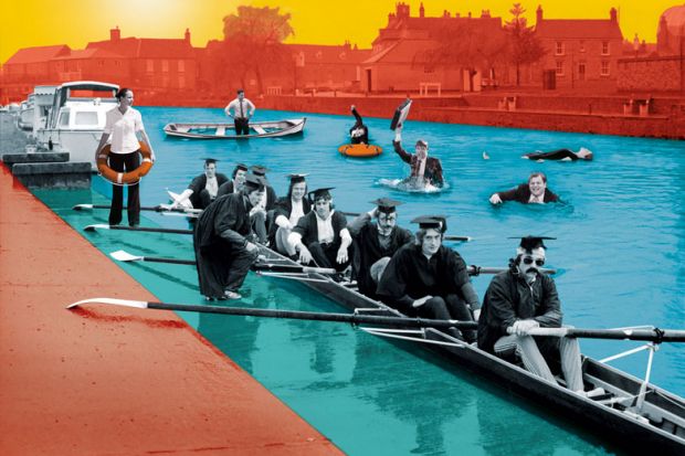 Graduates in rowing boat with people in suits in the water