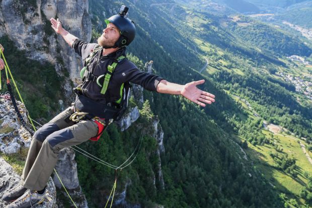 A man doing bungee jump from a cliff, Occitanie, Florac, France to illustrate French academics fear ‘grim’ funding situation ahead under Barnier