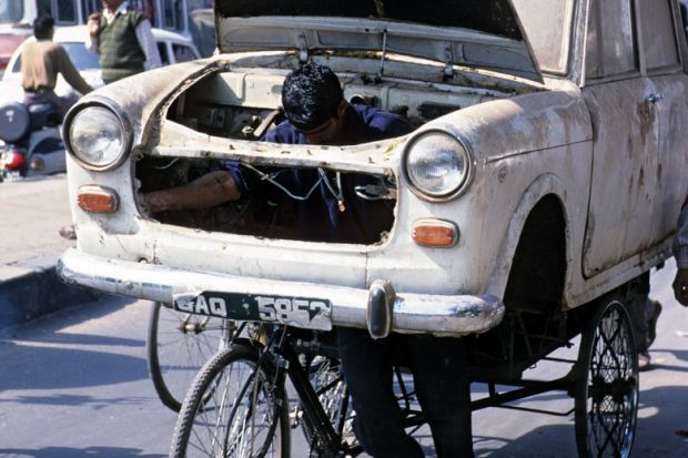 Man transporting car body Man transporting car body to illustrate Indian court ruling ‘saves university places’ for upper castes