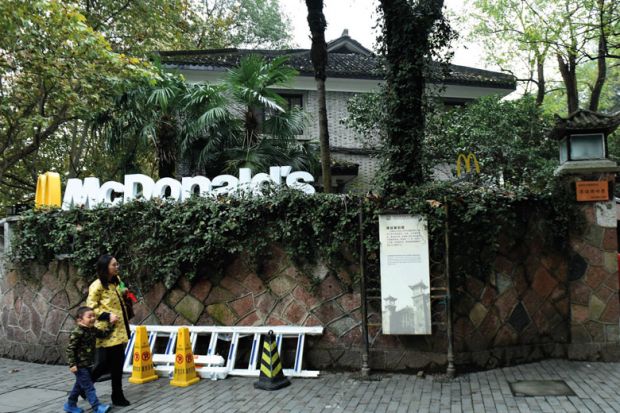 Tourists pass by a McDonald's transformed from a house of Chiang Ching-kuo's villa Tourists pass by a McDonald's transformed from a house of Chiang Ching-kuo's villa to illustrate US diplomats may get research dollars to dole out in soft power bid