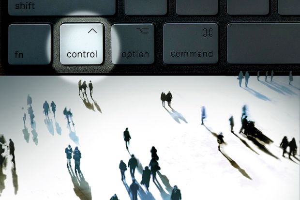 Concept image of a group of people around a control key on a computer Concept image of a group of people around a control key on a computer Concept image of a group of people around a control key on a computer to illustrate Digital strategy can’t be left to CIOs; senior leaders must take ownership