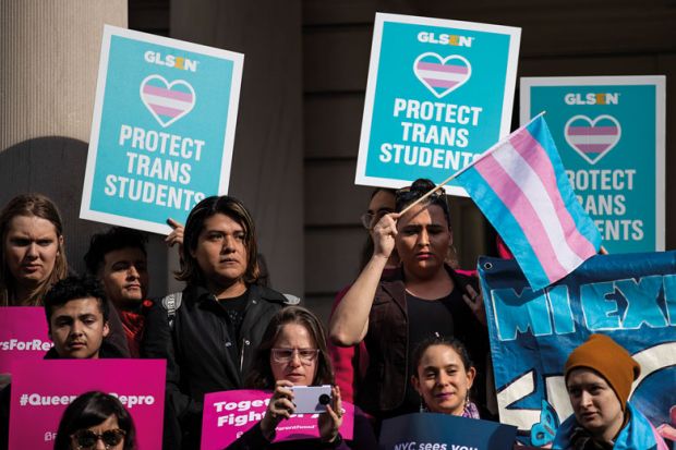 LGBT activists rally in support of transgender people on the steps of New York City Hall LGBT activists rally in support of transgender people on the steps of New York City Hall to illustrate Biden turns to transgender rights in discrimination rules redraft
