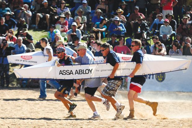 Competitors running in a in the bottomless rowing boat. Competitors running in a in the bottomless rowing boat as a metaphor for Australian commercialisation push hampered by lack of data