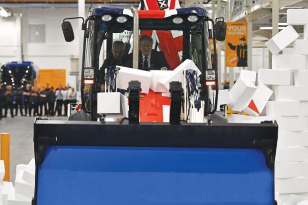 Boris Johnson drives a JCB through a fake wall as a metaphor for Willetts: Tories risk losing ‘red wall’ if they cut university places
