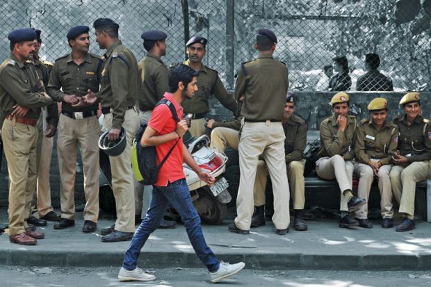 Akhil Bharatiya Vidyarthi Parishad (ABVP) members taking a break at a march from Ramjas College to the Faculty of Arts at Delhi University to illustrate Political interference  on campus is  wasting India’s demographic dividend